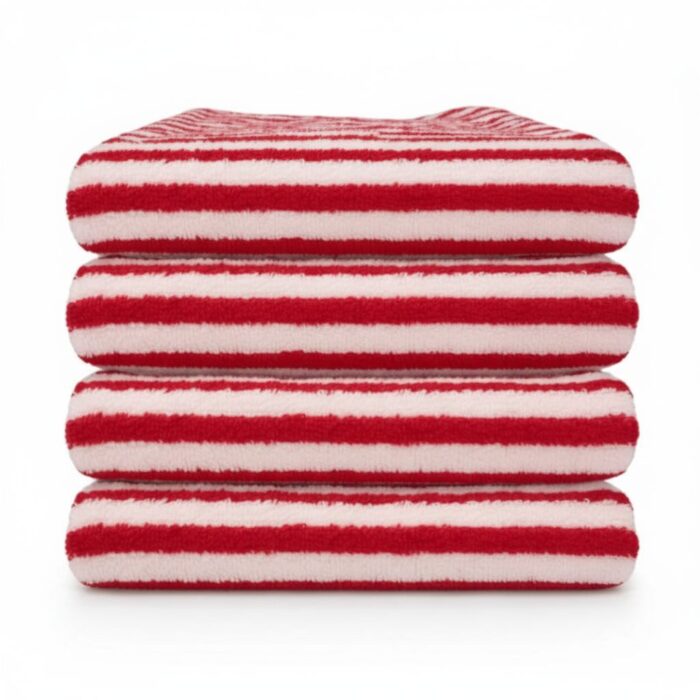Close-up of 600GSM towel texture — 100% cotton loops showing plush, absorbent construction, 50x90 cm size